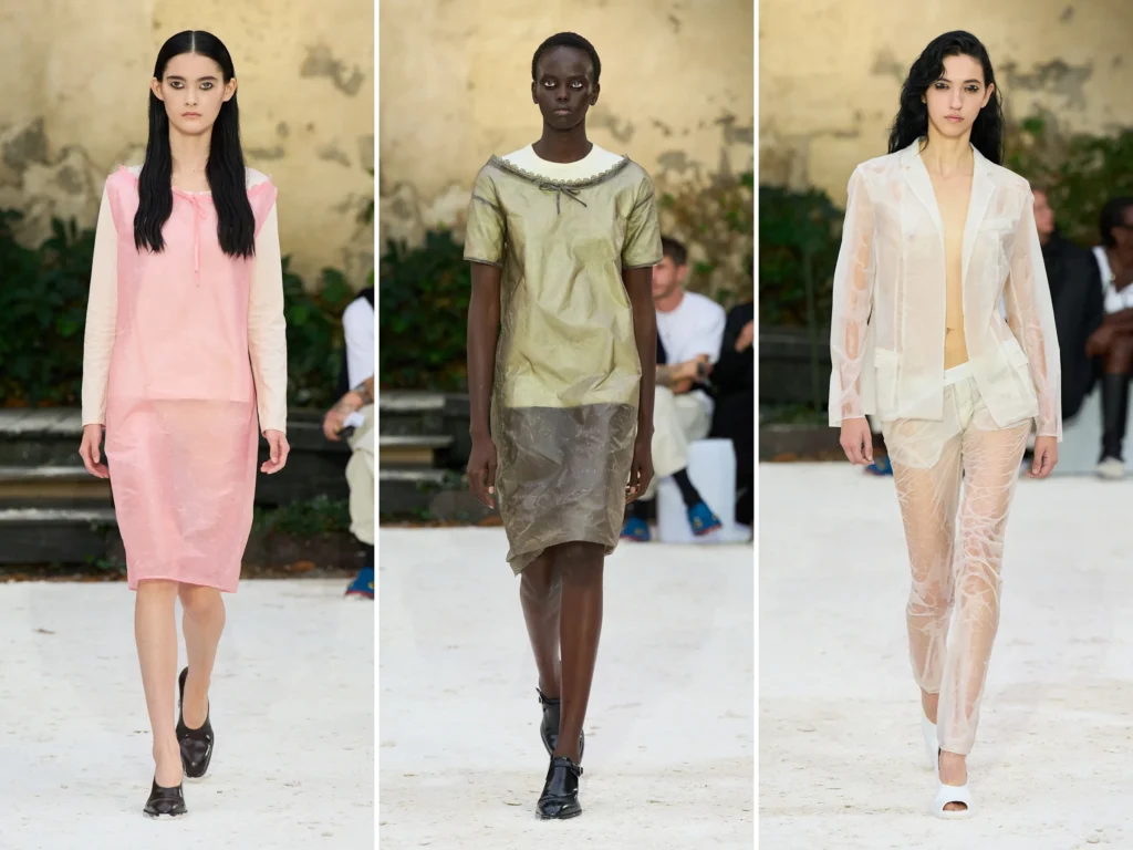Trois silhouettes du défilé Hodakova printemps-été 2027 : une robe rose, une robe bicolore et un ensemble blanc à motifs.