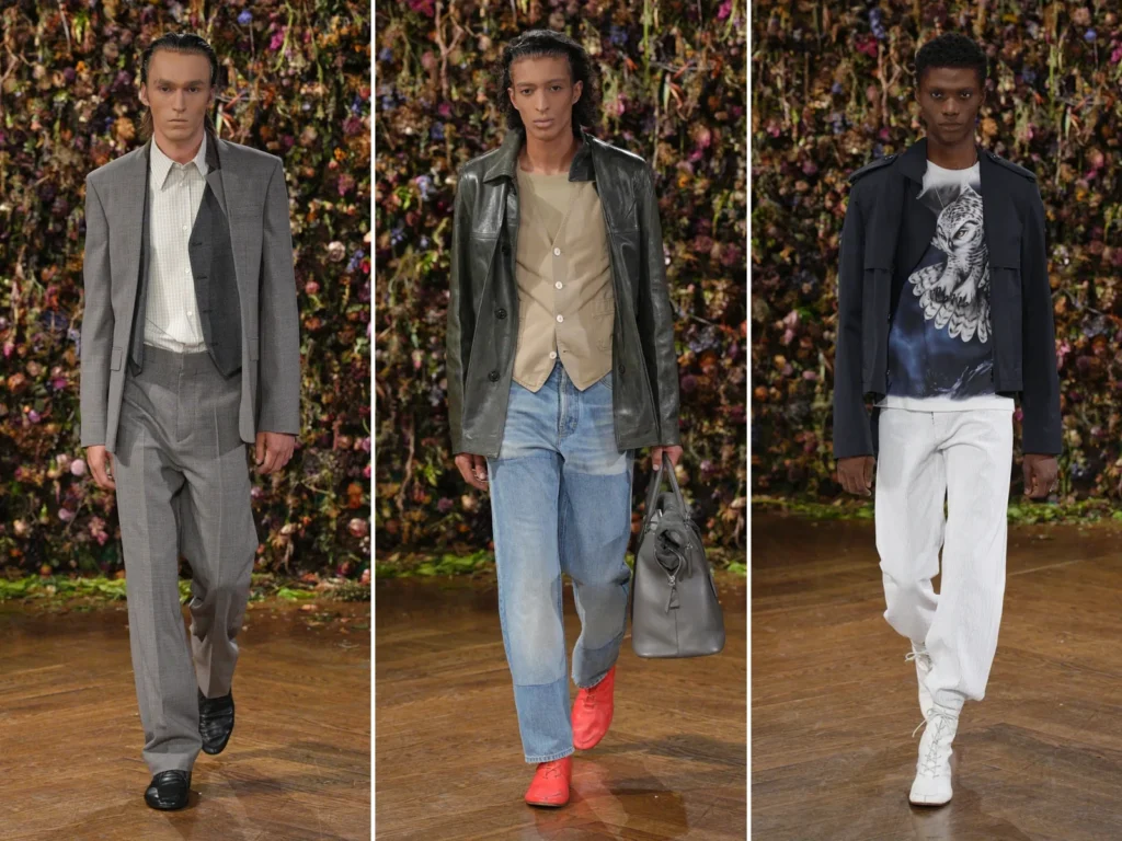 Trois silhouettes homme du défilé Maison Margiela printemps-été 2027, entre costume gris, cuir noir, denim et pantalon blanc.